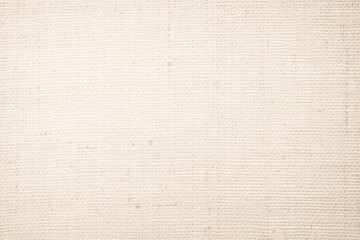 Closeup detail of beige fabric texture background. High resolution photo.