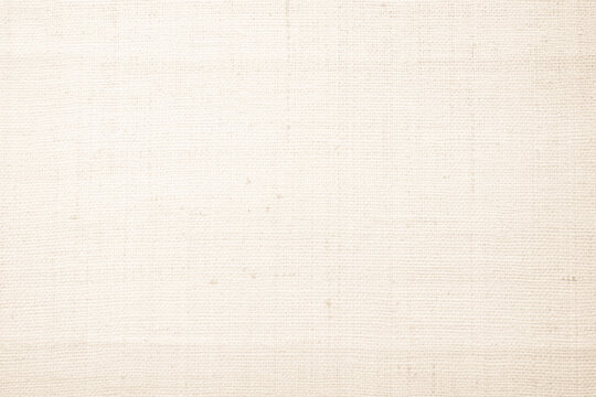 Brown sackcloth woven texture background in natural pattern. Jute hessian burlap, linen background in light beige cream color blank. Weaving canvas fiber line cotton cloth textured as organic.