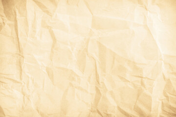 Crumpled brown paper texture background for design with copy space for text or image.