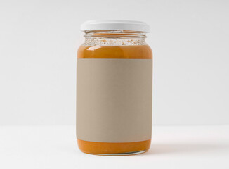 Glass bottle Jar with jam or mustard or  ingredient  on white background, studio Photo