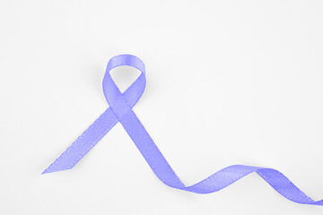 A light purple cancer ribbon, Stomach Cancer Awareness Month