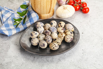 Raw quail eggs in the bowl