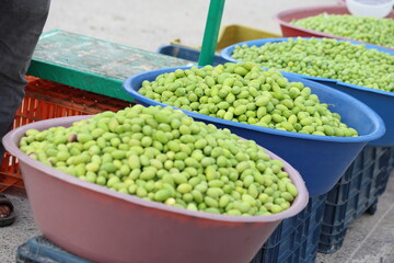 closeup of green olives on the market