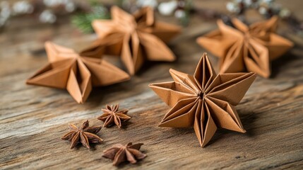 Cute handmade origami postcard from recycled paper with anise star on wooden background. Homemade gingerbread cookies. Holiday craft, family tradition, quality time., simple easy do it yourself decor