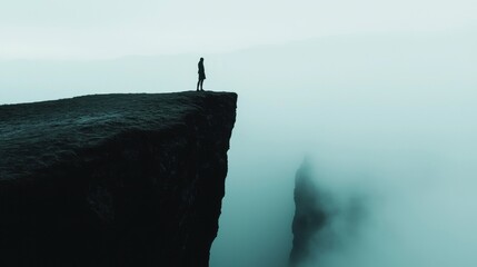 Obraz premium The Unknown Result: A person standing at the edge of a cliff, jumping into a misty fog below, symbolizing taking action despite not knowing the outcome