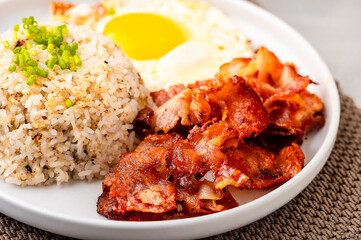 Pinoy Bacsilog Breakfast Meal – Bacon, Sinangag (Fried Rice) and Egg 