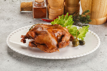 Baked small chicken with spices