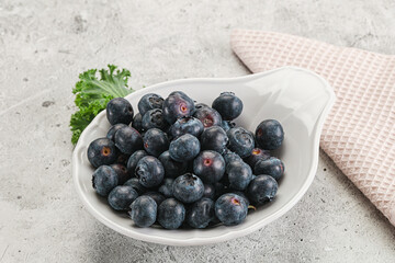 Sweet ripe blueberry on the bowl