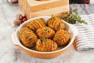 Baked baby potato with thyme