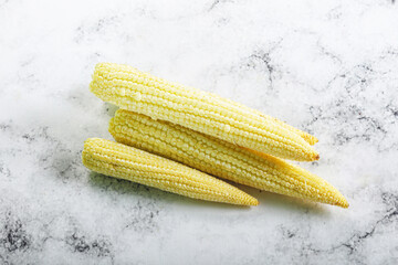 Raw sweet baby corn heap