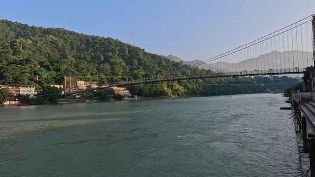 Scenic View of Ram Jhula on River Ganga, Rishikesh - Serene Landscape