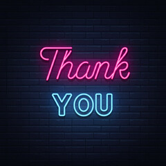 A vibrant "Thank You" glowing in pink and blue neon lights, set against a dark brick wall background, creating a modern and striking effect