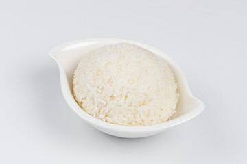 Rice in a white bowl on a white background