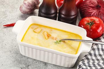 Salmon cream soup with vegetables
