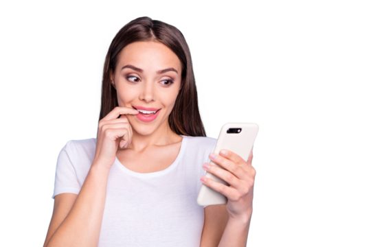 Close up photo of inspired cute teen looking into her modern technology reading novelties wearing white t-shirt isolated over blue background