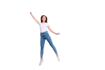 Full body photo of cute youngster raising arms up wearing white t-shirt denim jeans sneakers isolated over blue background