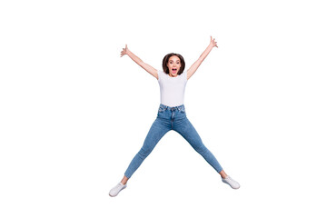 Full size photo of cheerful youth raising hands shouting wearing white t-shirt denim jeans isolated over blue background