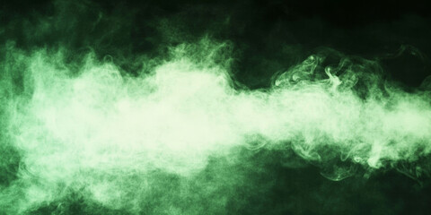 Obraz premium Abstract green smoke swirls and billows against a dark background.