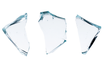 Three pieces of broken glass are shown in a white background. The glass is shattered and scattered, creating a sense of chaos and destruction. The image evokes a feeling of fragility and vulnerability