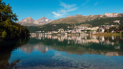 St. Moritz Lake, picturesque town and peaks of Albula Alps in the distance