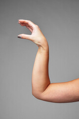 signaling a small size against a gray background