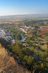 View from the top of the mountain of the village Arcos de la frontera at sunset.