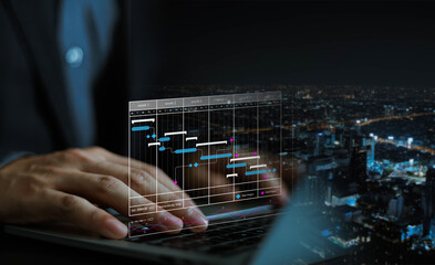 Business planning calendar schedule concept. Businessman using pen to write on calendar on virtual...