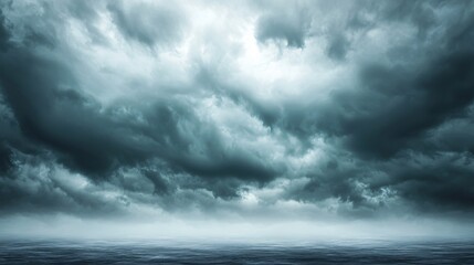 Obraz premium Overcast sky with dark clouds threatening rain, gloomy weather, moody atmosphere