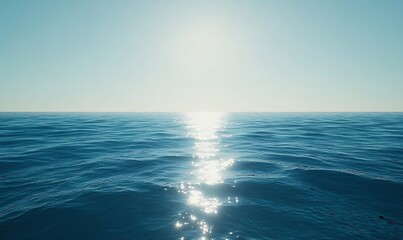 Obraz premium A blue ocean with sunlight shining through the water surface