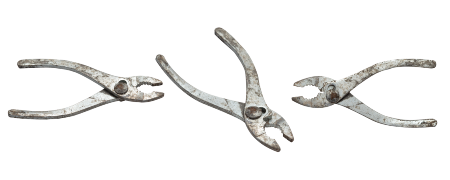 Three old rusted pliers laid out, showing wear and tear from use, ideal for industrial or tool-related themes.