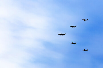 The plane is flying through the clouds.