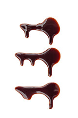 Chocolate sauce stains on white background