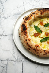Pizza with fruits, pear, fig and pine nut