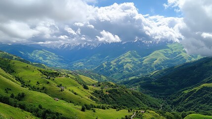 Fototapeta premium A panoramic view of lush green mountains under a cloudy sky.
