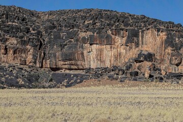 Rocky black mountains in far South of Namibia