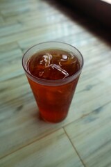 A glass of refreshing cold sweet tea, close up view.