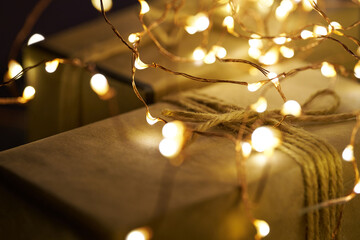 Festive Christmas lights glowing on a wrapped gift