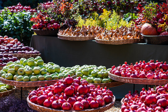 Assorted fresh fruits displayed on market tables