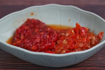 Traditional Indonesian sambal is sambal garlic (red chili sauce), which is served in a bowl