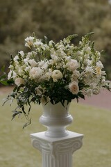 Elegant floral arrangement in classic white vase