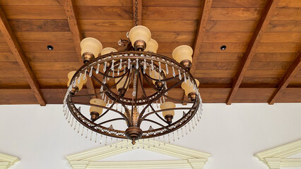 Decorative hanging lamps are made of copper and decorated with hanging crystals