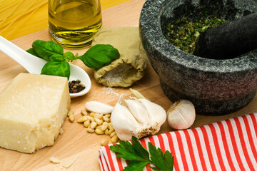 ingredients and utensils for spaghetti pesto