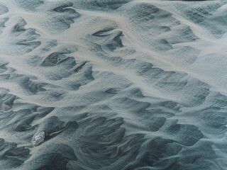 Aerial view of braided river patterns in Iceland