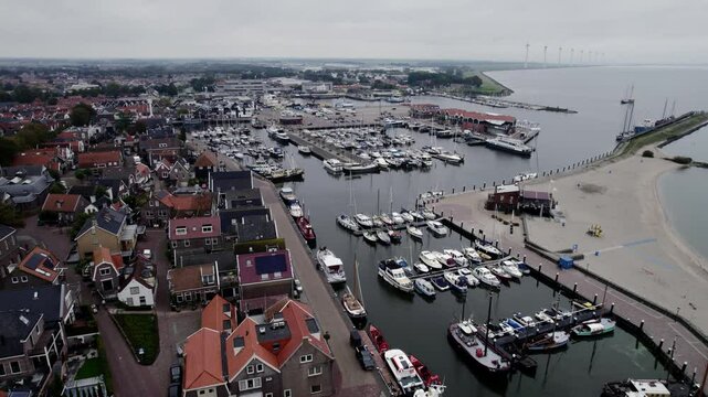 harbor in the Netherlands shot with a drone in urk small village town in Europe with the north sea