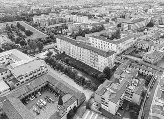 Grayscale aerial view of Verona, the city of love, featuring the arena and the Adige River in Veneto