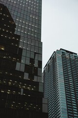 Naklejka premium Modern high-rise office buildings against a cloudy sky