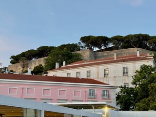 Scenic view of St. George's Castle on a hillside during sunset in Lisbon, Portugal