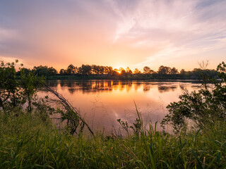 Obraz premium Sunset Over The River