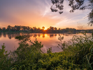 Obraz premium Sunset Over The River