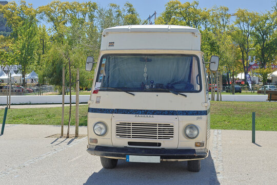 Vintage peugeot j7 camper van parked outdoors on a sunny day